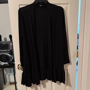 Long cardigan with ruffles on bottom viscose polyester and spandex